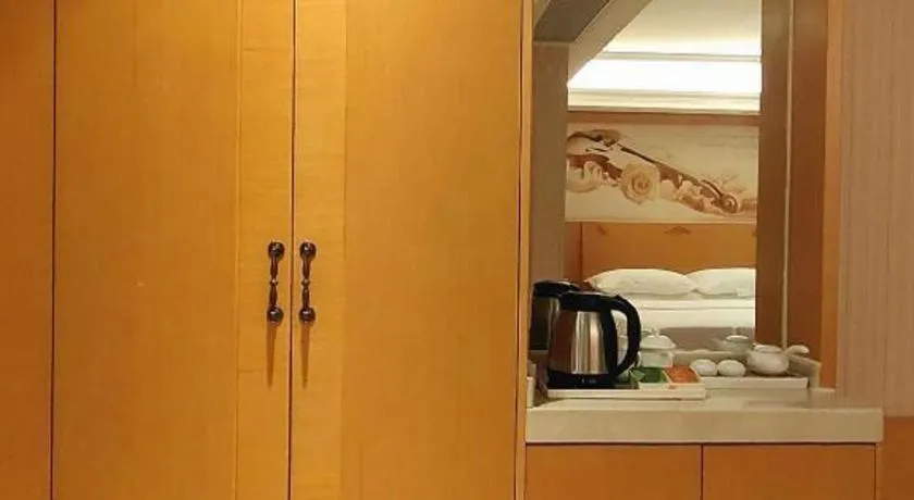 Bed in Vienna Hotel Guangxi Beiliu Passenger Station