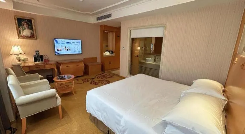 Bed in Vienna Hotel Guangxi Beiliu Passenger Station