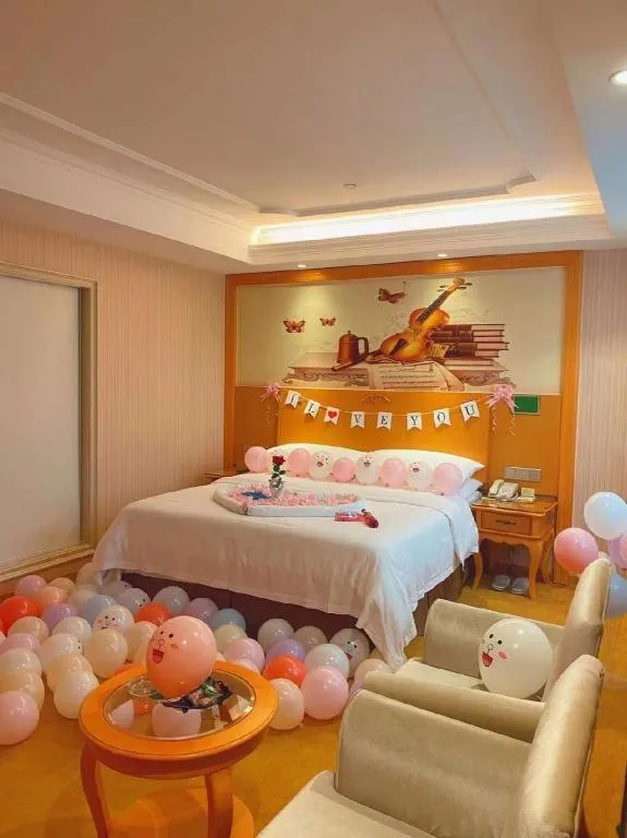 Bed in Vienna Hotel Guangxi Beiliu Passenger Station