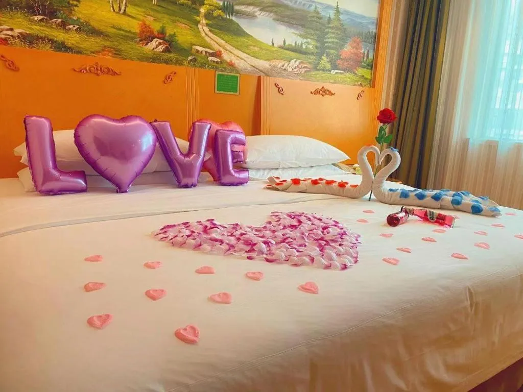 Bed in Vienna Hotel Guangxi Beiliu Passenger Station