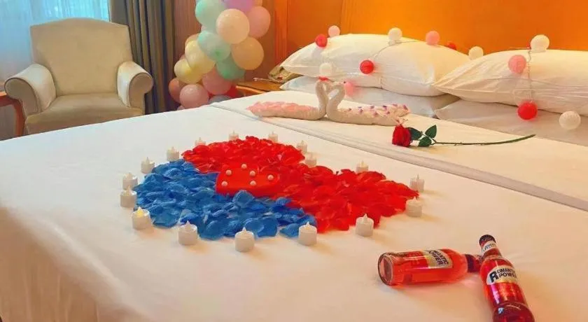 Bed in Vienna Hotel Guangxi Beiliu Passenger Station