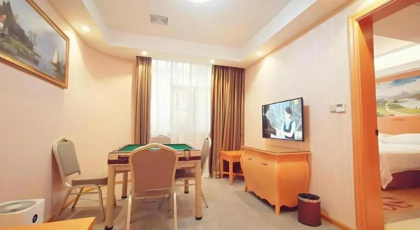 Bed in Vienna Hotel Guangxi Beiliu Passenger Station