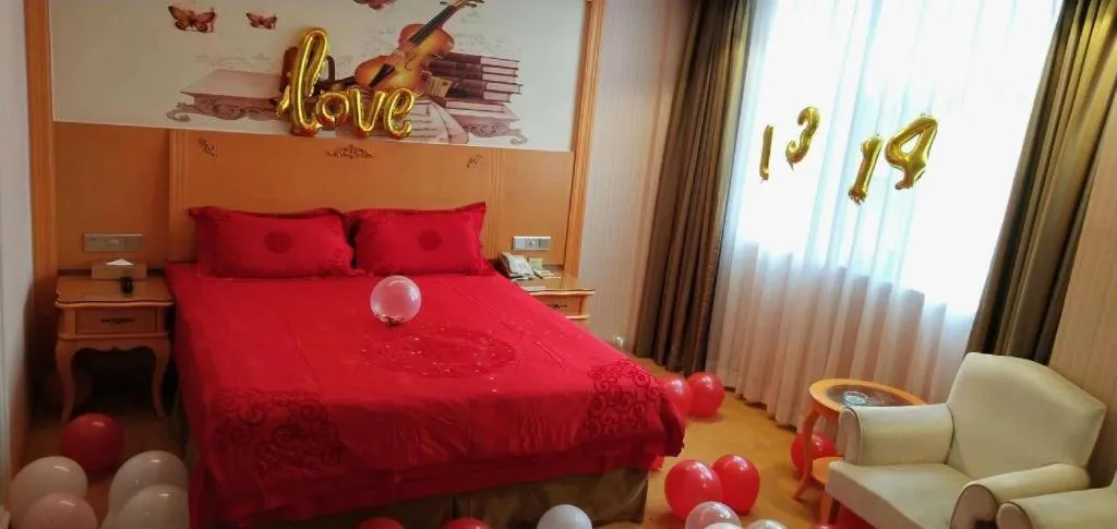 Bed in Vienna Hotel Guangxi Beiliu Passenger Station