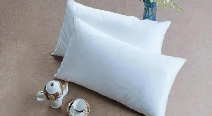 Bed in Vienna Hotel Guangxi Beiliu Passenger Station