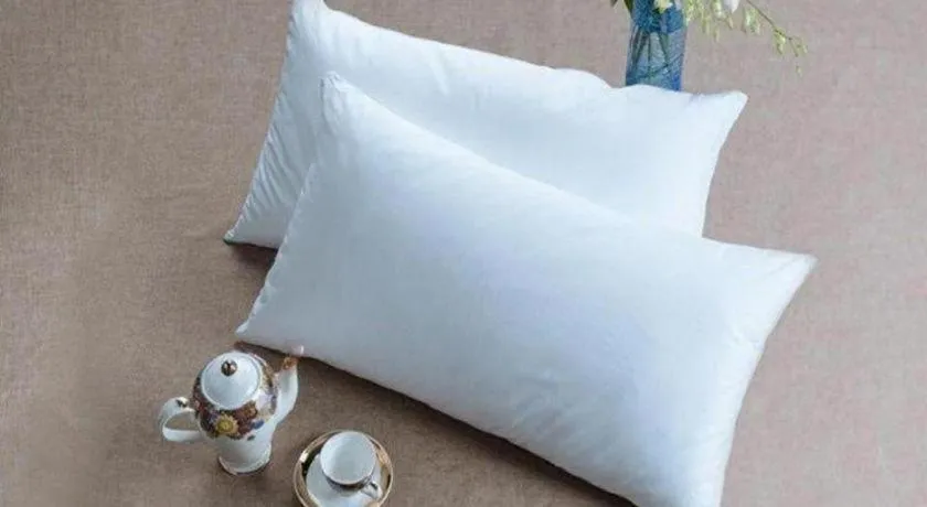 Bed in Vienna Hotel Guangxi Beiliu Passenger Station