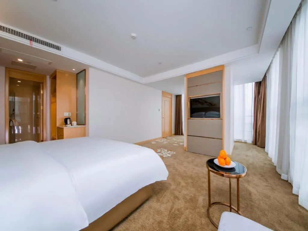 Bed in Vienna Hotel Wuhan Wenhua Avenue Jiangxia Keting Metro Station