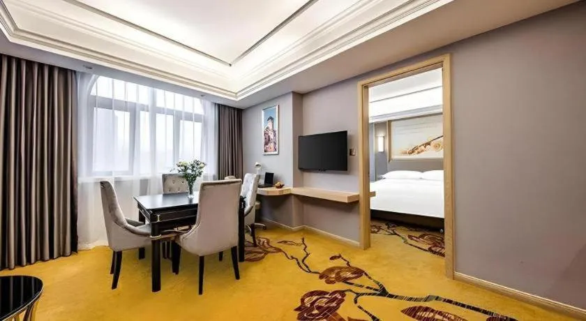 Bed in Vienna Hotel Zhejiang Lishui Qingtian Post Building