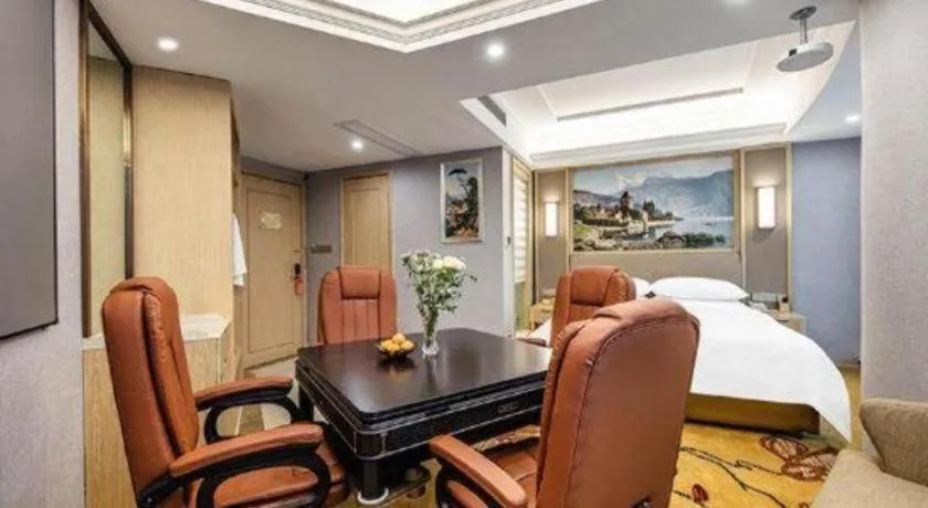 Bed in Vienna Hotel Zhejiang Lishui Qingtian Post Building