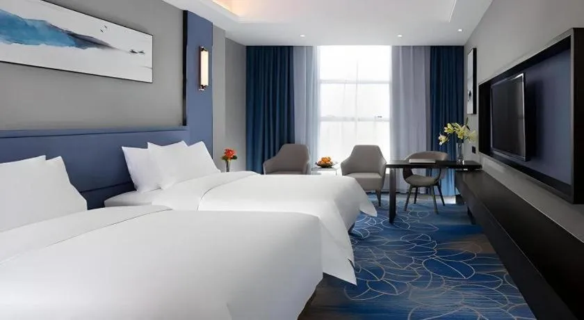 Bed in Vienna Hotel Guangdong Foshan Yihuanlishui