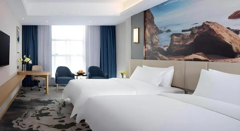 Bed in Vienna Hotel Guangdong Foshan Yihuanlishui