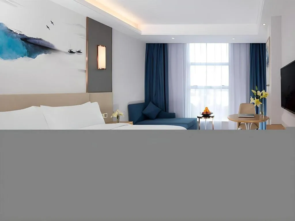 Bed in Vienna Hotel Guangdong Foshan Yihuanlishui
