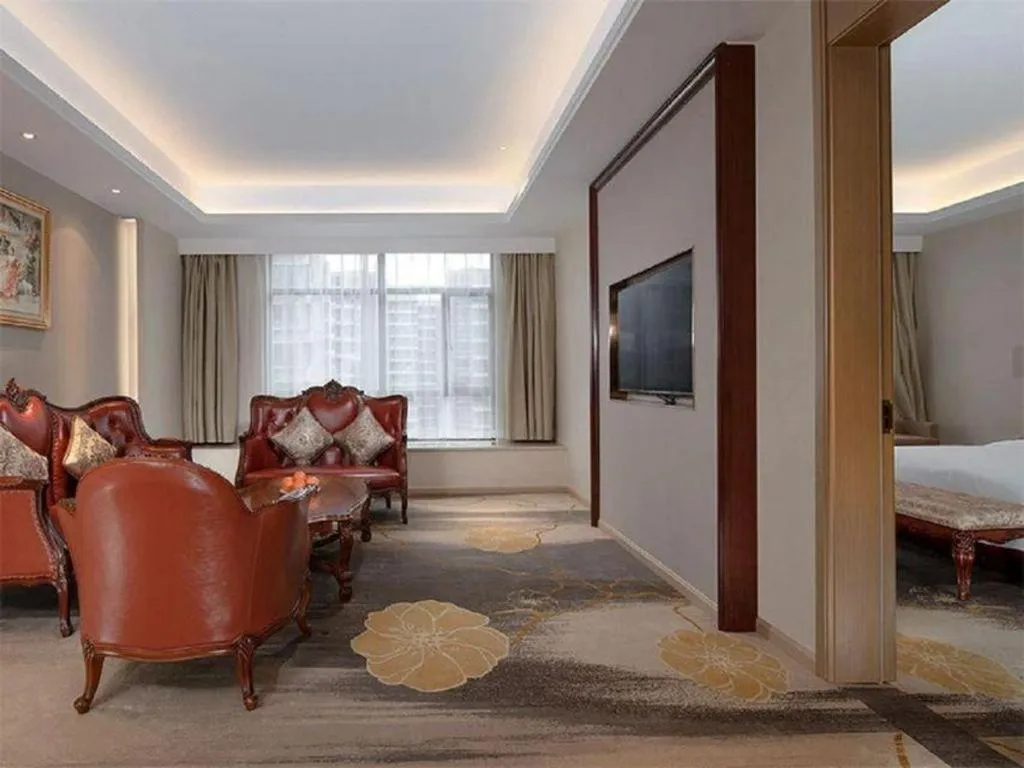 Bed in Vienna Hotel Xinfeng West High-Speed Railway Station