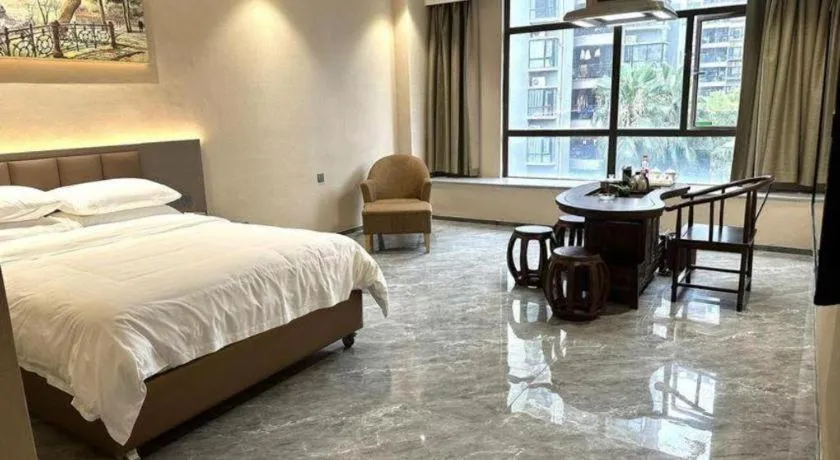 Bed in Vienna Hotel Xinfeng West High-Speed Railway Station