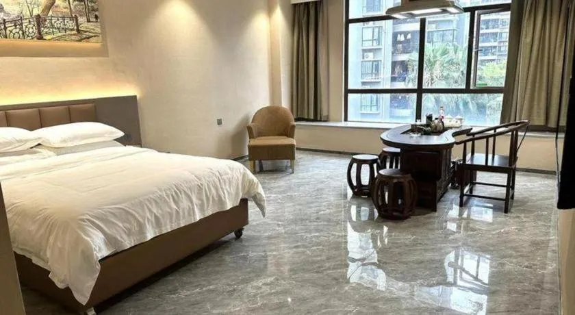 Bed in Vienna Hotel Xinfeng West High-Speed Railway Station