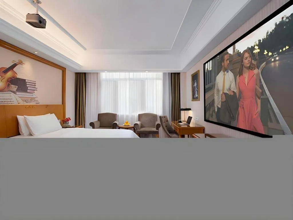 Bed in Vienna Hotel Shanxi Datong High-Speed Railway Station Wanda Plaza