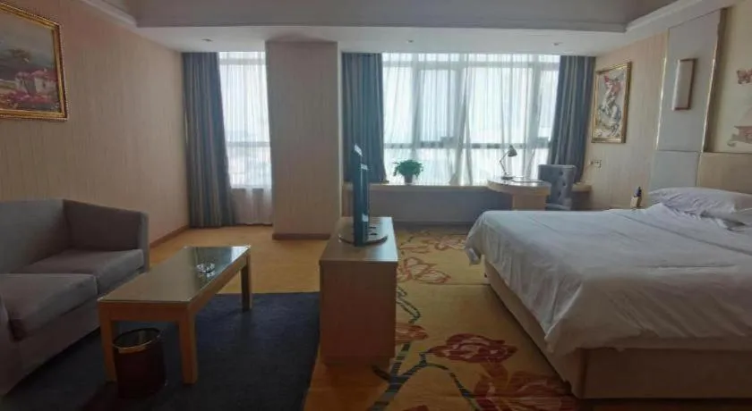 Bed in Vienna Hotel Shandong Qingzhou Ancient City