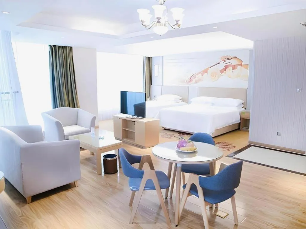 Bed in Vienna Hotel Shandong Qingzhou Ancient City