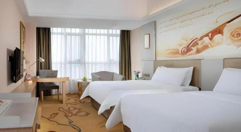 Bed in Vienna Hotel Shandong Qingzhou Ancient City