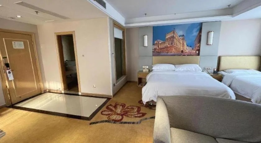 Bed in Vienna Hotel Shandong Qingzhou Ancient City