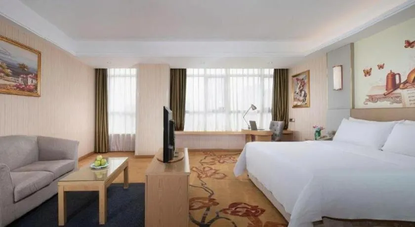 Bed in Vienna Hotel Shandong Qingzhou Ancient City