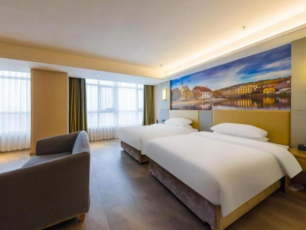 Bed in Vienna Hotel Shandong Qingzhou Ancient City