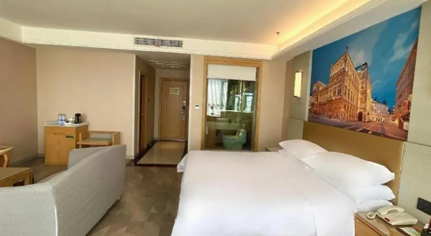Bed in Vienna Hotel Shandong Qingzhou Ancient City