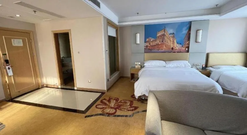 Bed in Vienna Hotel Shandong Qingzhou Ancient City