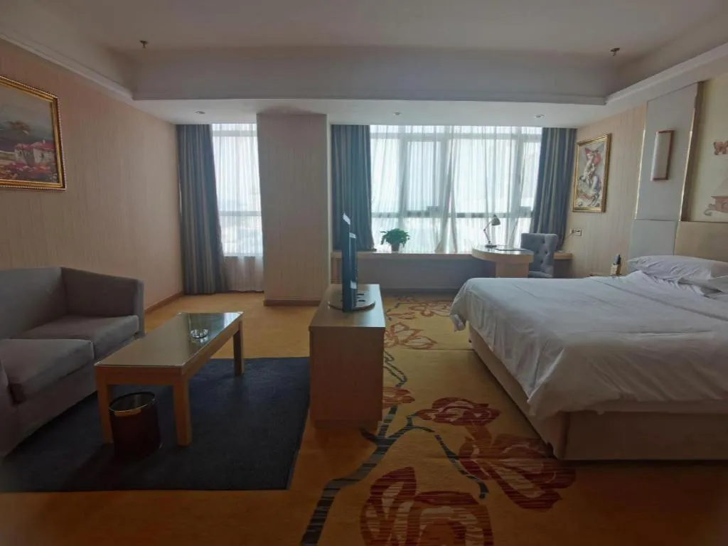 Bed in Vienna Hotel Shandong Qingzhou Ancient City
