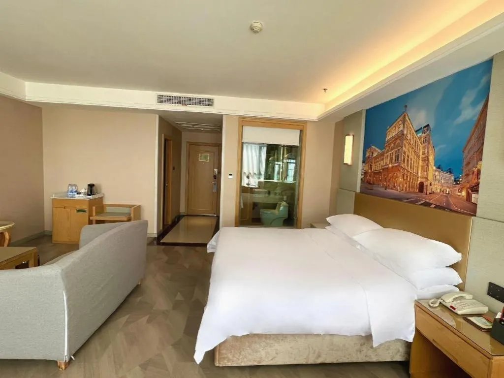 Bed in Vienna Hotel Shandong Qingzhou Ancient City