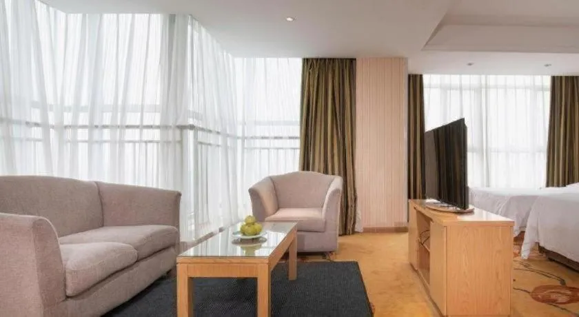 Bed in Vienna Hotel Shandong Qingzhou Ancient City