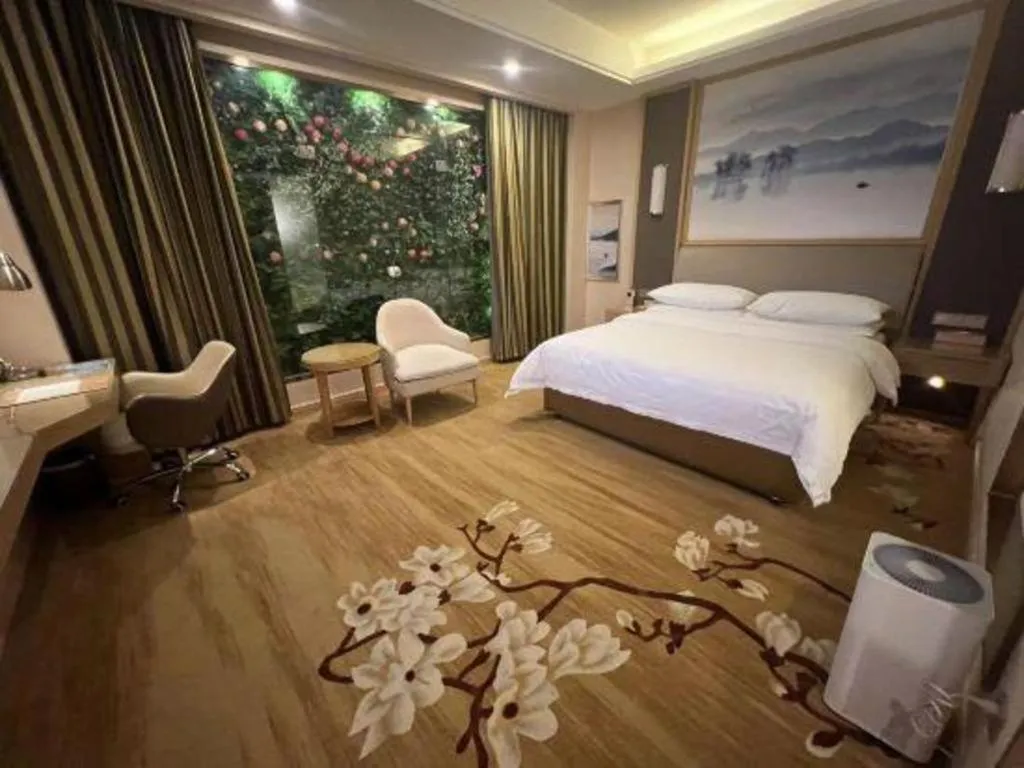 Bed in Vienna Hotel Tianjin Binhai International Airport Free Trade Zone