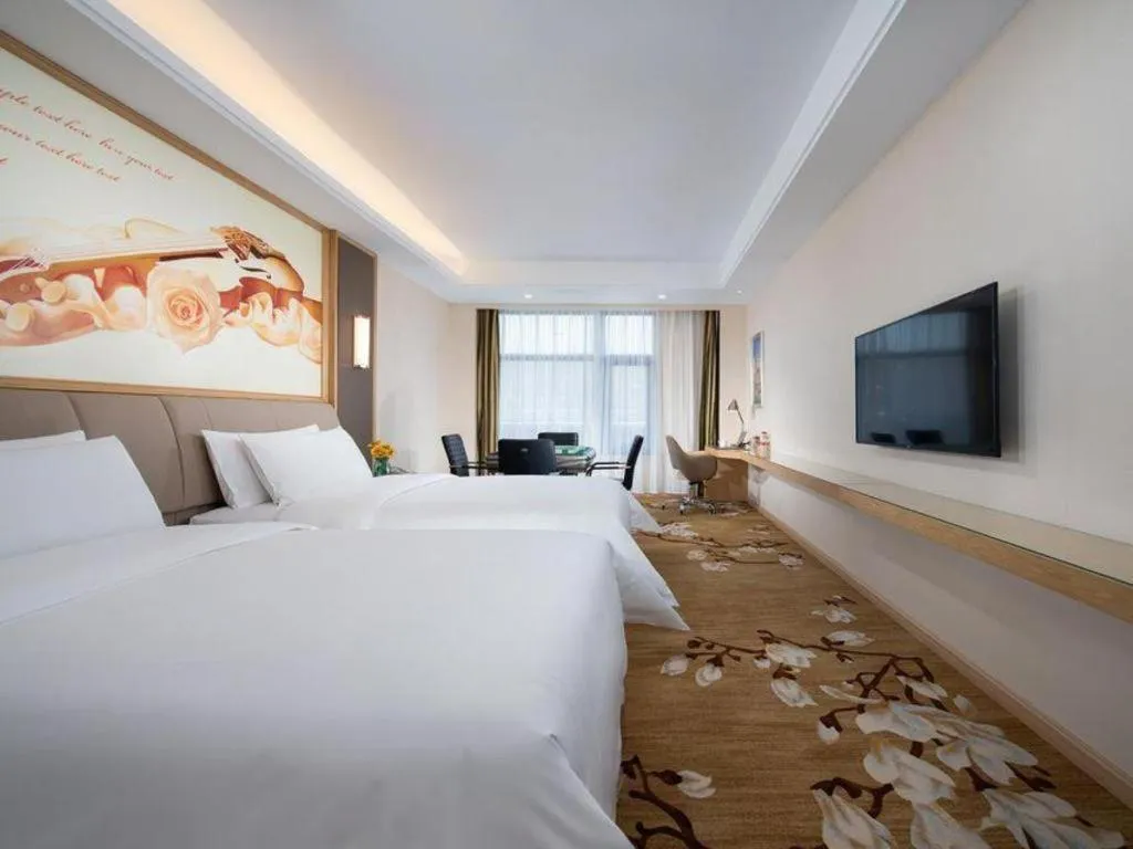 Bed in Vienna Hotel Tianjin Binhai International Airport Free Trade Zone