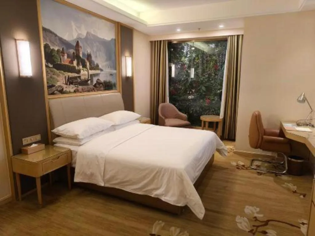 Bed in Vienna Hotel Tianjin Binhai International Airport Free Trade Zone