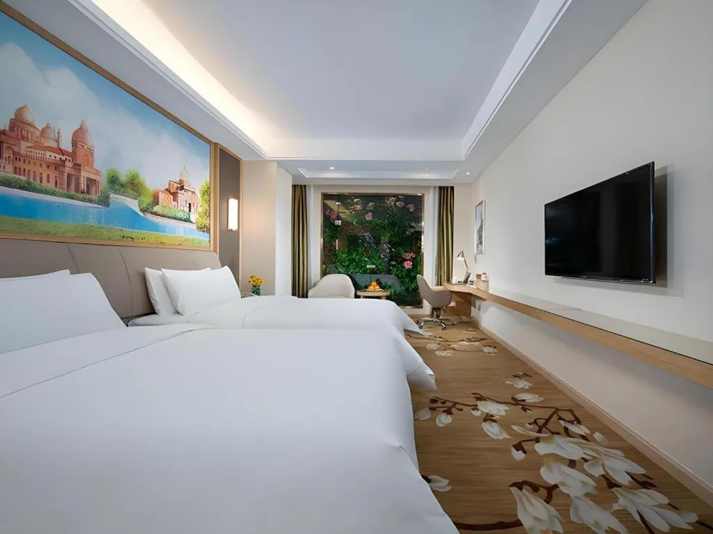 Bed in Vienna Hotel Tianjin Binhai International Airport Free Trade Zone