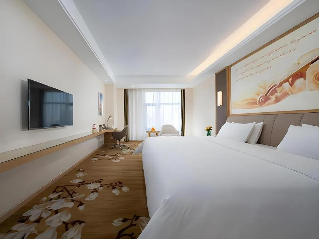 Bed in Vienna Hotel Tianjin Binhai International Airport Free Trade Zone