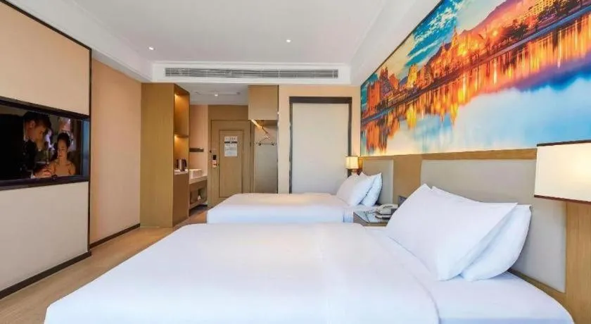 Bed in Vienna Hotel Tianjin Jinzhong Street