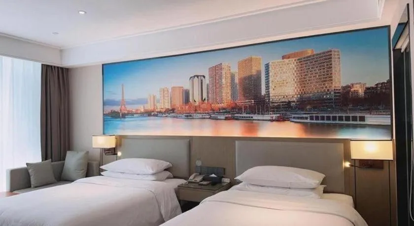 Bed in Vienna Hotel Tianjin Jinzhong Street