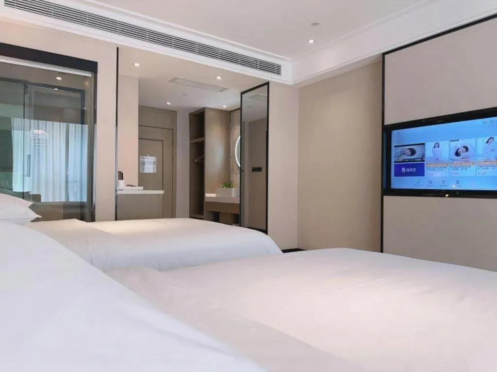 Bed in Vienna Hotel Tianjin Jinzhong Street