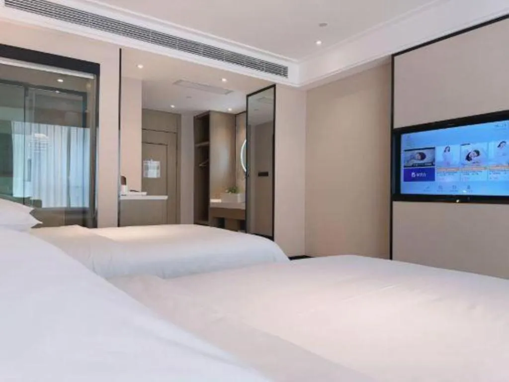 Bed in Vienna Hotel Tianjin Jinzhong Street