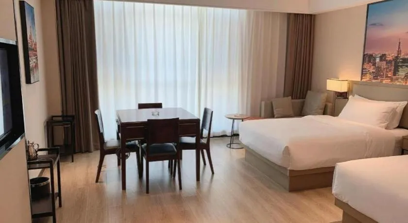 Bed in Vienna Hotel Tianjin Jinzhong Street