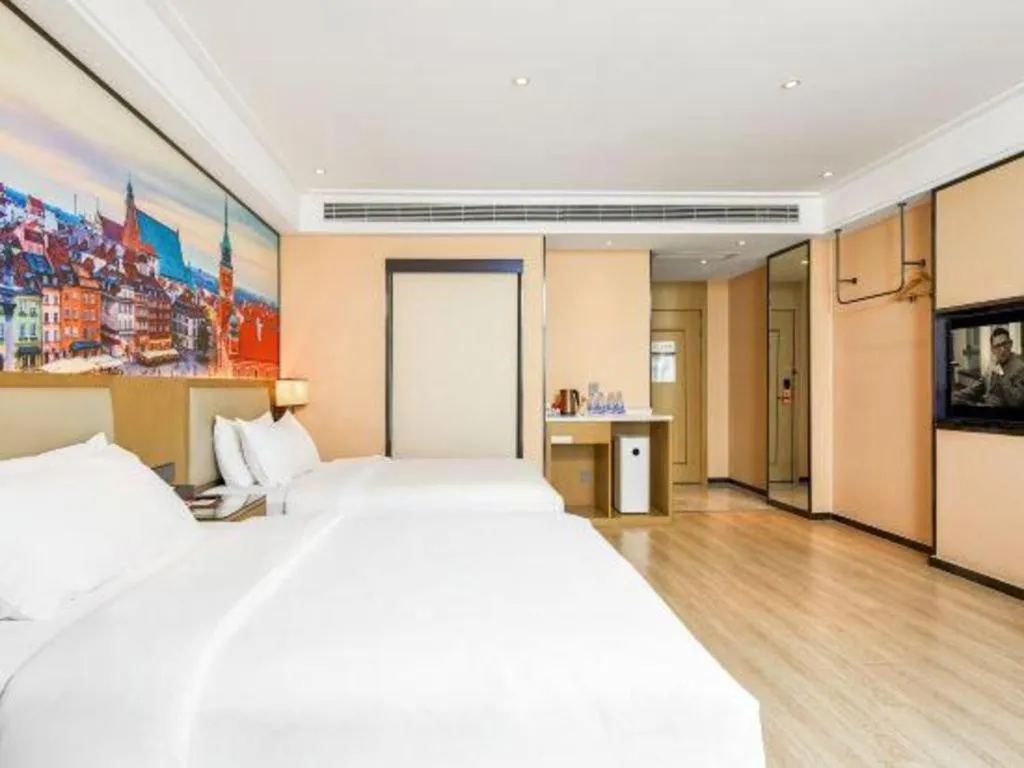 Bed in Vienna Hotel Tianjin Jinzhong Street