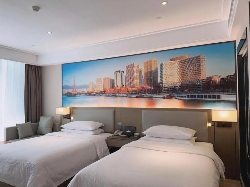 Bed in Vienna Hotel Tianjin Jinzhong Street