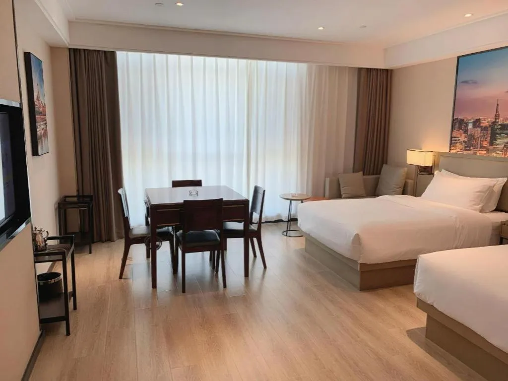 Bed in Vienna Hotel Tianjin Jinzhong Street