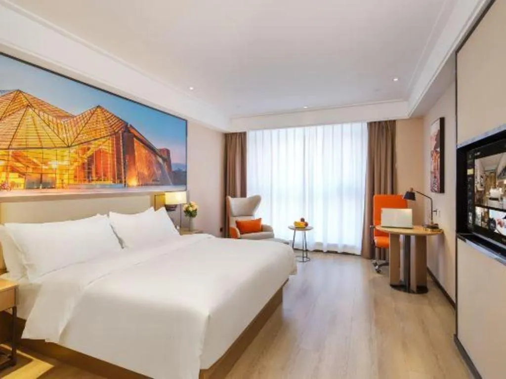 Bed in Vienna Hotel Tianjin Jinzhong Street