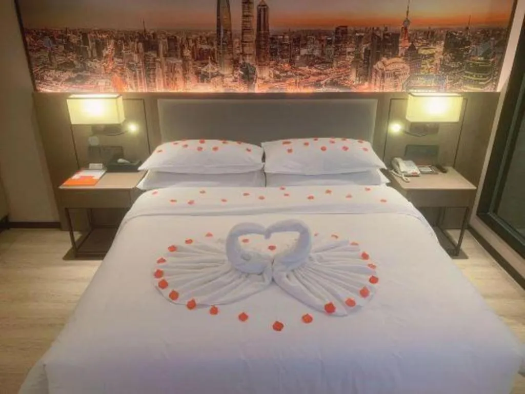 Bed in Vienna Hotel Tianjin Jinzhong Street