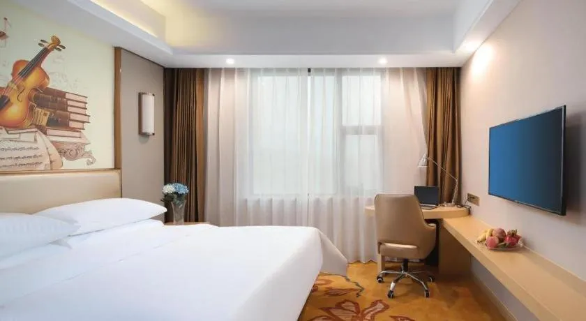 Bed in Vienna Hotel Nanchang Wanli