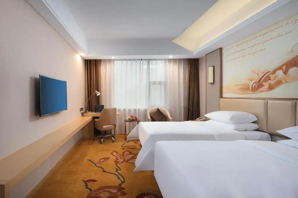Bed in Vienna Hotel Nanchang Wanli