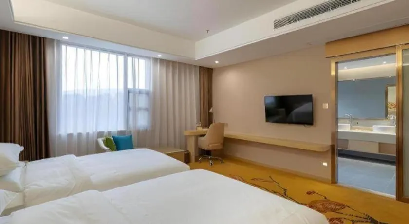 Bed in Vienna Hotel Nanchang Wanli