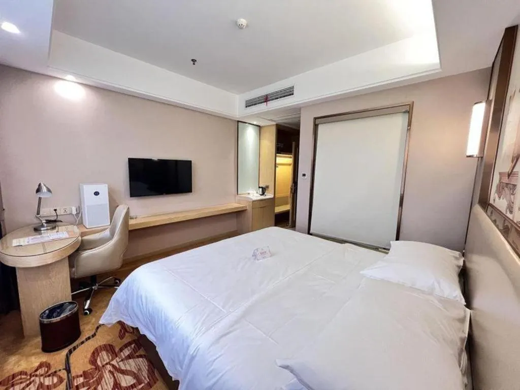 Bed in Vienna Hotel Nanchang Wanli