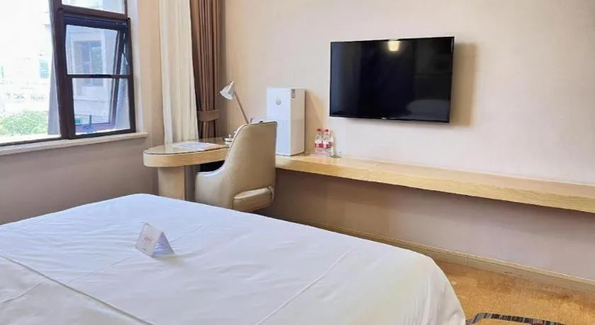 Bed in Vienna Hotel Nanchang Wanli